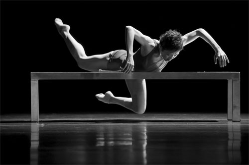 Dancer from the Compañía Nacional de Danza/ National Ballet of Spain (Madrid, Spain) performing In Transit. Choreography by Annabelle Lopez Ochoa. Photographer: Jesus Vallinas.